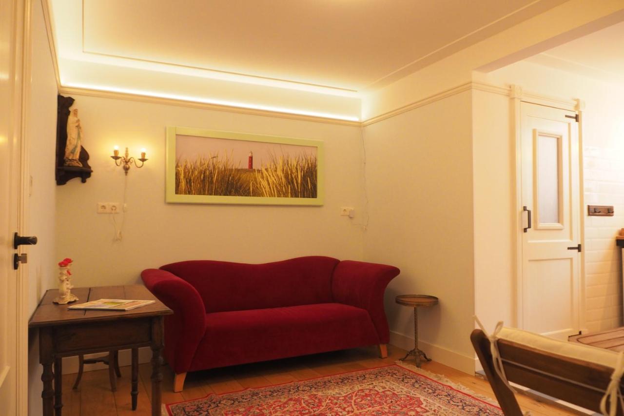 B&B Bureau Warmoesstraat Den Burg Esterno foto