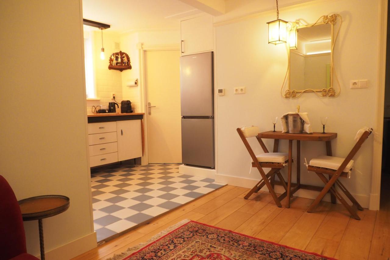 B&B Bureau Warmoesstraat Den Burg Esterno foto